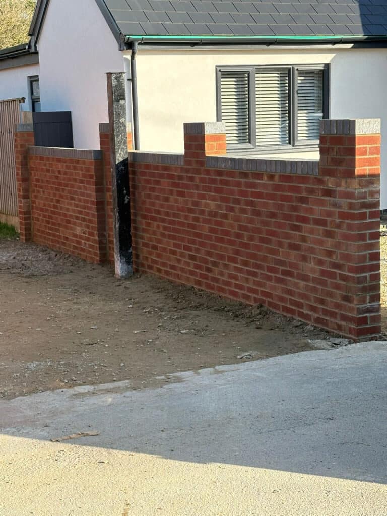 Garden wall being built on a cheltenham property by Cheltenham Landscaping & Building Services Ltd